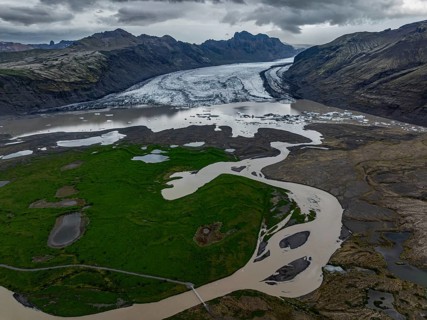 Glacier, glacier tongue, glacier lake, mountains, cloudy, aerial view, panorama, summer,