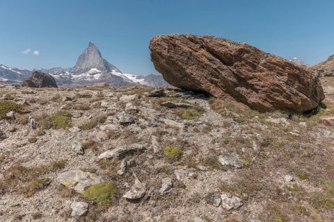 Towering Matterhorn dominates the skyline over rugged terrain and displays natural beauty. The