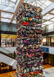 Interior design, artwork made from compressed scrap cars, partially vacant Shopping Quartier 205 in