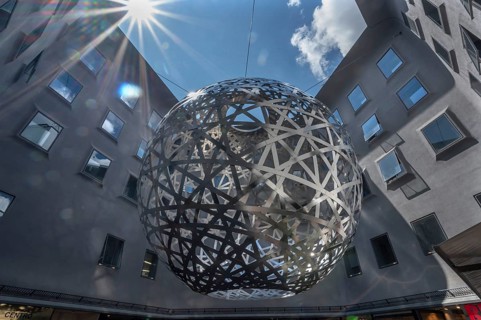 Steel sphere, Sphere, a work of art by Ólafur Eliasson, Fünf Höfe shopping arcade, Munich, Bavaria,