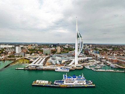 Portsmouth Harbour over Spinnaker Tower from a drone, Portsmouth, Gosport, England, United Kingdom