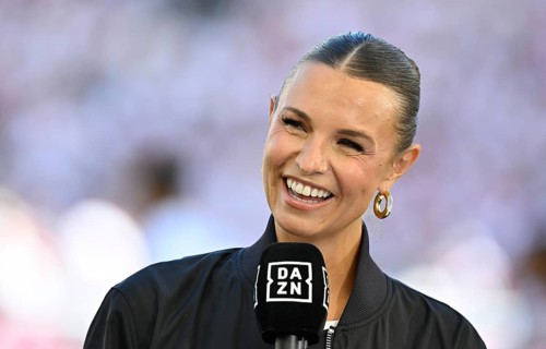 DAZN presenter Laura Wontorra, smiling in interview microphone microphone logo portrait,