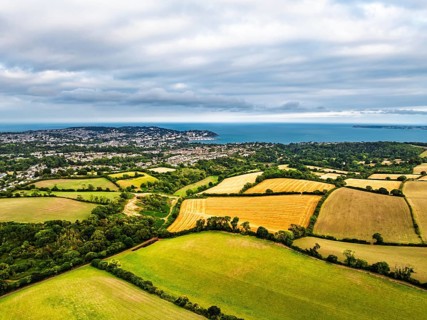 Colors of Fields and Farms over Torquay from drone, Torbay, Devon, England, United Kingdom