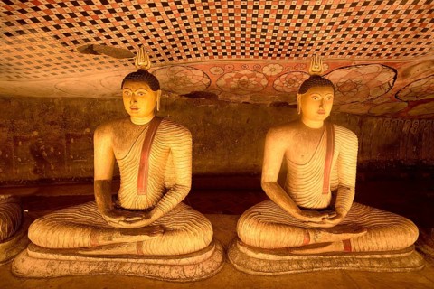 Buddha statues and murals in Dambulla Cave Temple, Dambulla, Sri Lanka