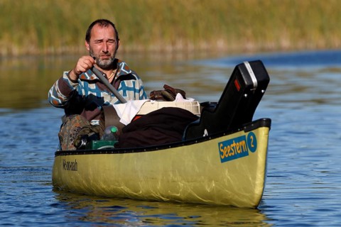 Canoeists in a canoe, Müritz National Park, Mecklenburg-Western Pomerania, Germany