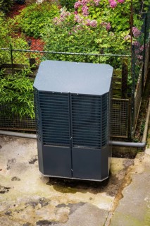 Heat pump in a backyard in Wuppertal, Germany, digitally reworked