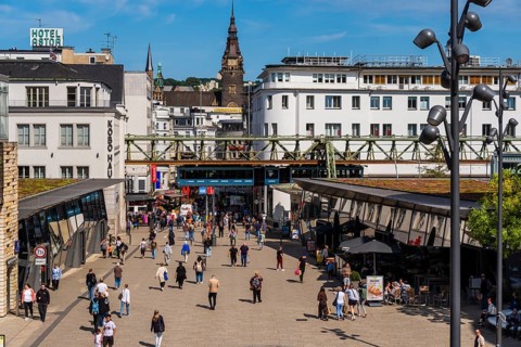 The Wuppertal suspension railway arrives at the Döppersberg stop in the city centre of Wuppertal,