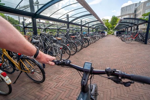 Bicycle parking spaces and boxes on the cycle path in the east of Utrecht, at Utrecht-Lunetten