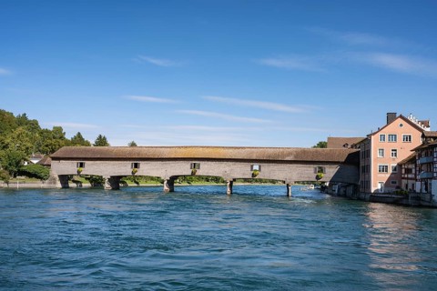 The historic wooden bridge over the Rhine was opened in 1816 and connects the German municipality