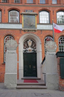 Entrance to the Schiffergesellschaft restaurant with painting, brick building, Old Town, Lübeck,