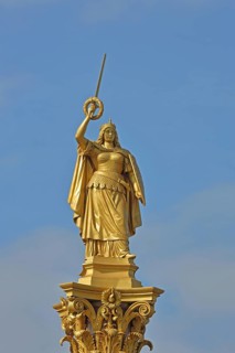 Golden sculpture Megalopolis with laurel wreath, sword and Wendish crown as an allegorical figure