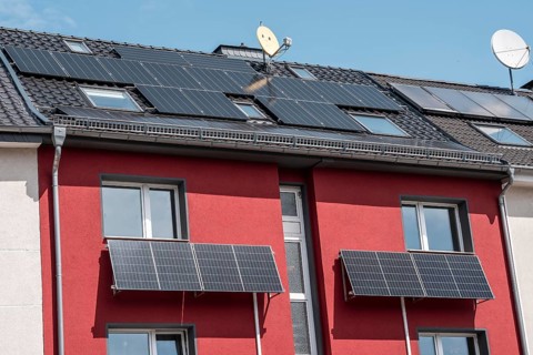 Residential building with photovoltaic modules on the façade and roof, North Rhine-Westphalia,