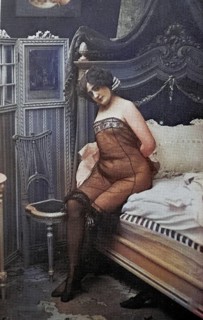 Female nude from around 1899, erotic postcard, Playgirl, A woman in a nude corset sits on a bed in