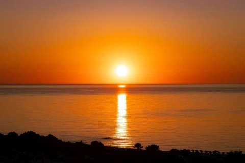 The sun rises on the Costa Rei, a stretch of coastline on the Italian Mediterranean island of