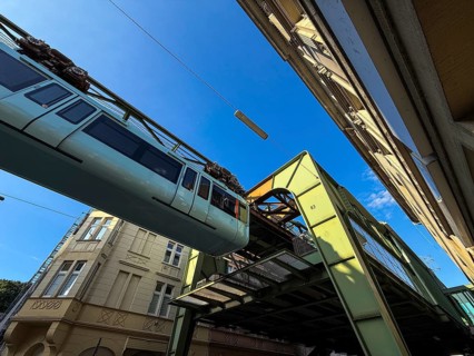 The Wuppertal suspension railway arrives at the Sonnborn stop, Wuppertal, Germany