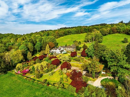 Farms over Coniston Water from drone, Lake District National Park, Cumbria, UK