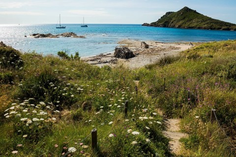 Picturesque coastal hiking trail and wild beach, Sentier du littoral, Plage Ranc, Cap Taillat,