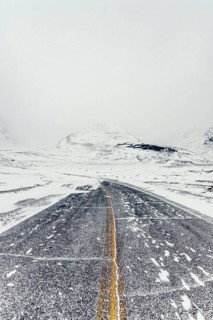 Winter road trip on the Icefields Parkway with lots of snow and ice, Banff National Park, Jasper