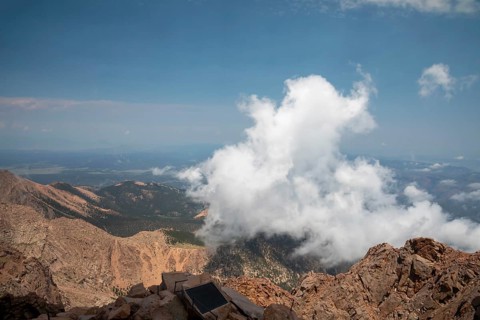 Colorado Springs, Colorado - Clourds rise near the summit of Pikes Peak, a 14, 115' mountain in
