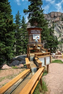 Colorado Springs, Colorado - A sluice along the highway to the Pikes Peak summit offers tourists a