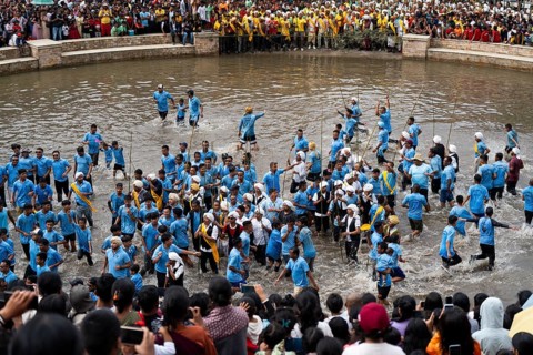 JOWAI, INDIA - JULY 14: People from the Pnar community march in a circle as they celebrate an event