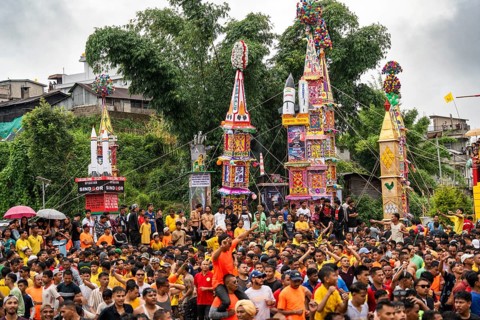 JOWAI, INDIA - JULY 14: People from the Pnar community march in a circle around a Rot as they