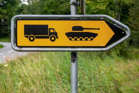 Signpost military lorries and tanks, Glarus, Switzerland