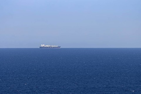 An LNG tanker sails along the Mediterranean Sea off the Costa Rei, a coastal section of the Italian