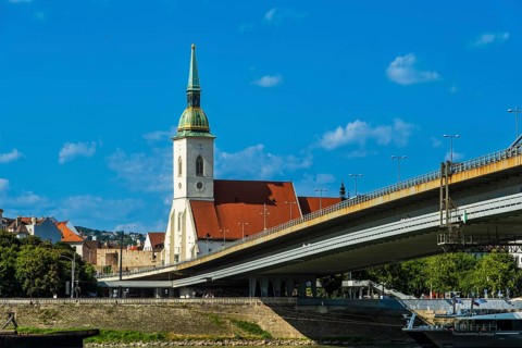 St Martin's Cathedral in Bratislava, in the foreground the Danube and the Bridge of the Slovak