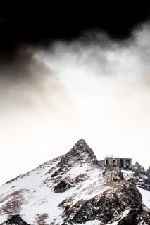 Snow blankets the peaks of Massif de Sancy, creating a serene winter landscape. The Regional