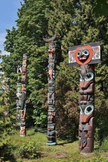 Totem poles, Chief Skedans Mortuary Totem Pole and Ga'akstalas Totem Pole, Stanley Park, Vancouver,