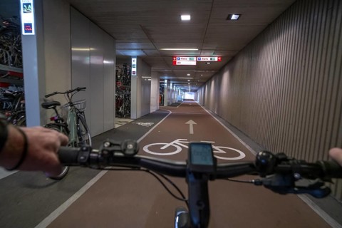 Ride your bike into and out of the bicycle car park at Utrecht Centraal station, Stationsplein,
