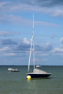 Boats on sea over Knoll Beach Studland, Poole, Dorset, England, United Kingdom