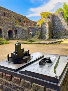 In front left small metal model of the original fortress building of the imperial palace of Emperor