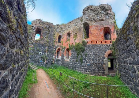 View into the interior of the northern inner part with partially restored secured masonry of the