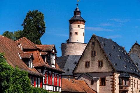 The old castle with Barbarossaplatz and the castle café in the old town centre of Büdingen, Hesse,