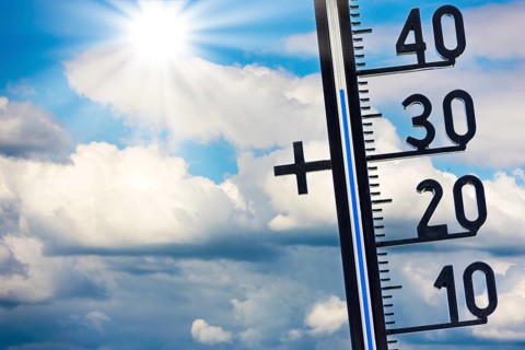 Symbolic image, global warming, thermometer shows high temperatures under a sunny sky with clouds,