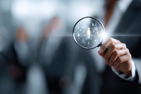 Concept of a brain hunter human resources in search of talented professionals for corporate office