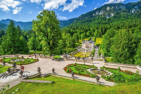 Baroque gardens at the Temple of Venus with a view of the water parterre and Linderhof Palace,