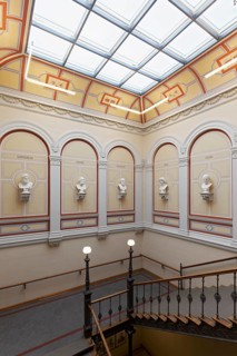 Staircase with busts of ancient Greek and Roman scholars, main building of the University of