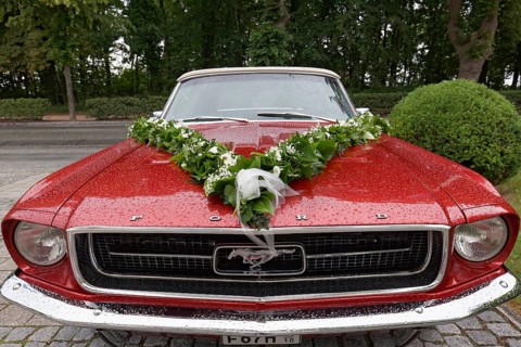 Ford Mustang Cabriolet from 1965, decorated as a wedding car, Baltic resort Kühlungsborn, Baltic