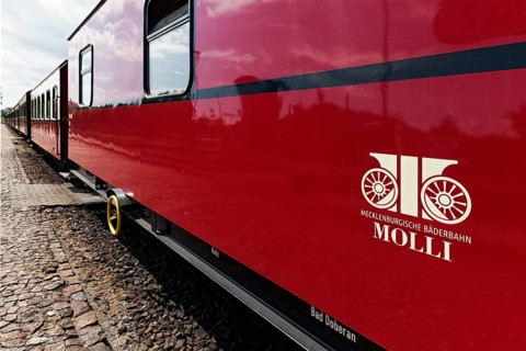 Mecklenburgische Bäderbahn Molli, logo on carriage, Baltic resort Kühlungsborn, Baltic Sea,