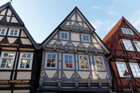 Half-timbered houses from the 17th century, façade with ornaments and historical inscriptions,