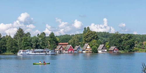 Boathouses, holiday homes on Lake Mirow, excursion boat, canoe, Mirow, Mecklenburg Lake District,