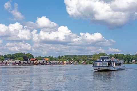 Boathouses, holiday homes on Lake Mirow, excursion boat, Mirow, Mecklenburg Lake District,