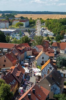 View from the tower of St Mary's Church, lake festival, Ferris wheel, old town centre, Röbel,