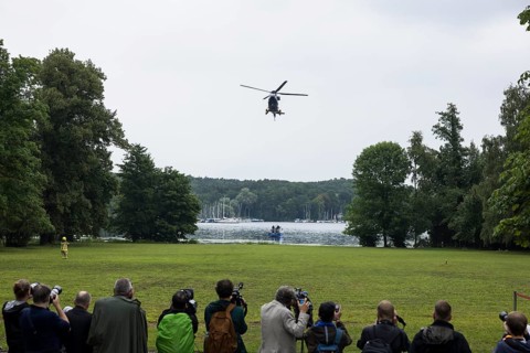 A helicopter lands in front of a joint meeting between Friedrich Merz (CDU, German Chancellor) and