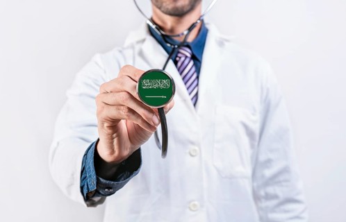 Saudi Arabia healthcare system, doctor holding stethoscope. Saudi Arabia health and medical