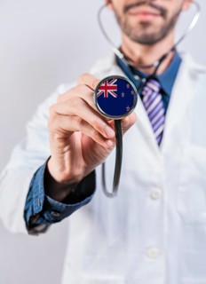 New Zealand health and medical insurance concept. New Zealand healthcare system, doctor holding
