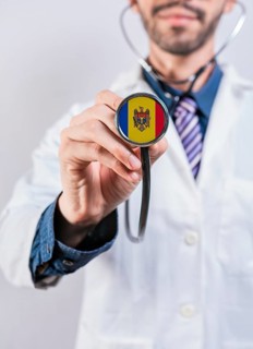 Moldova health and medical insurance concept. Moldova healthcare system, doctor holding stethoscope